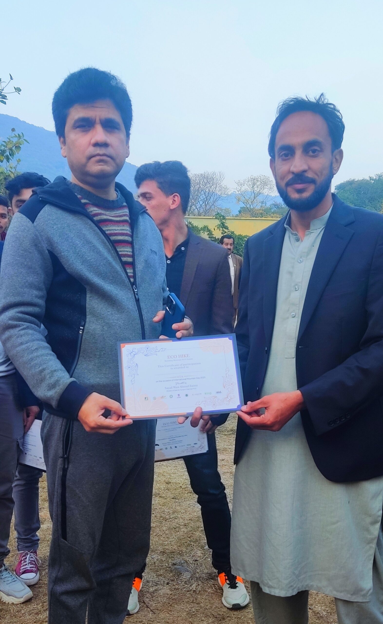 Muhammad Usman receiving the Certificate of Good Performance from the Mr. Sayad Wasi Ahmad Fatimi Khan Minister of Tourism, Pakistan